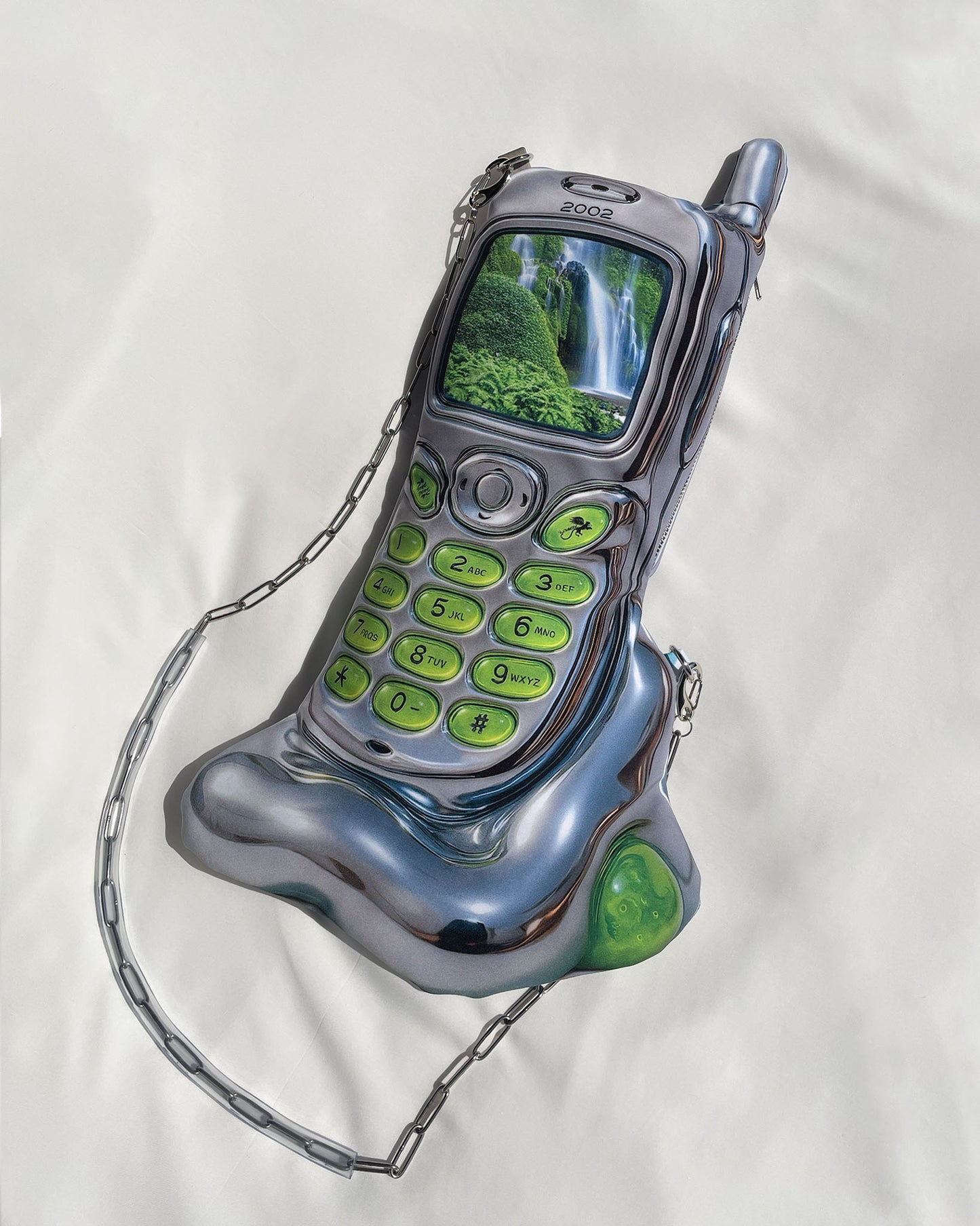Nature Cell Bag on white background – sculptural Y2K mobile phone design in vibrant photorealistic digital print