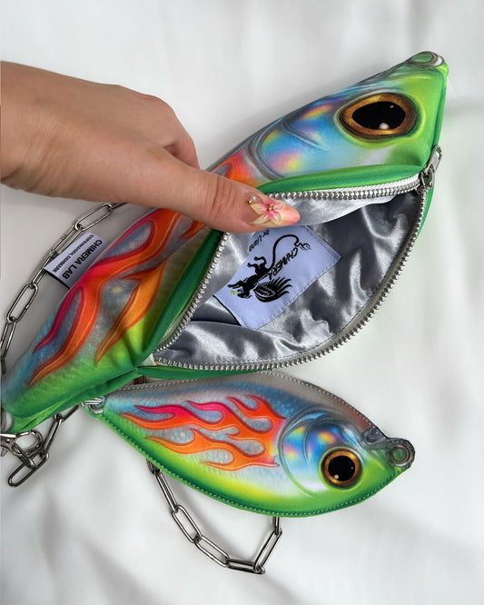 Interior view of Baby Trophy Fish pouch with silver satin lining and Chimera Lab label, zippered opening.