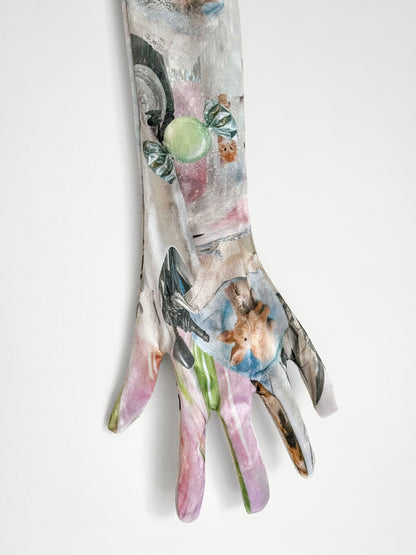 Printed long gloves with nostalgic print design on a white background.