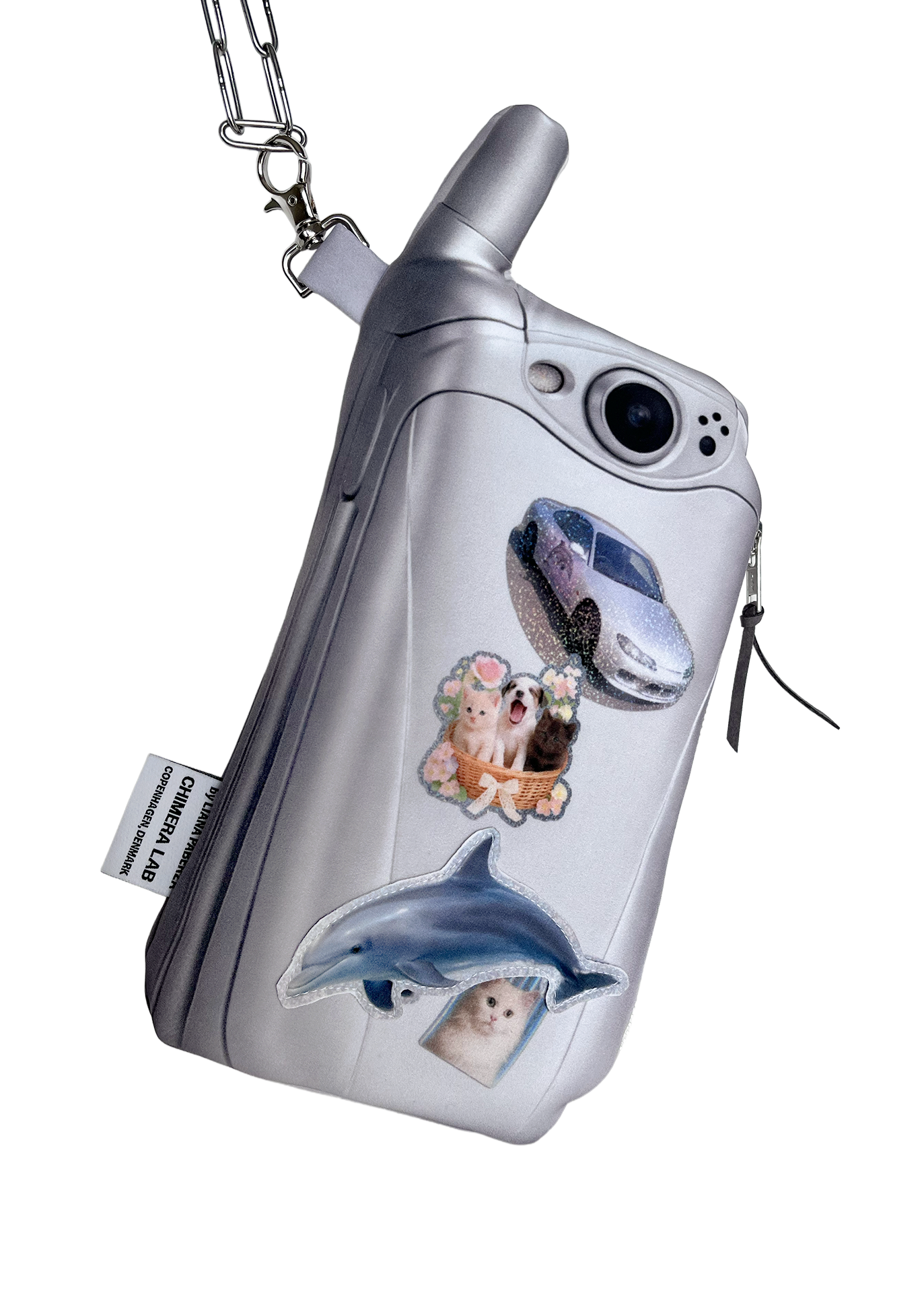 A silver flip phone-shaped zipper pouch with a carabiner clip, decorated with stickers of a car, a dog, a cat, and a dolphin, shown on a plain white background.