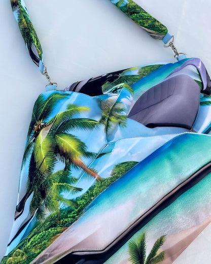 Close-up of Tropical Jetski Bag showing softshell texture, digital palm tree print, and padded sculptural form