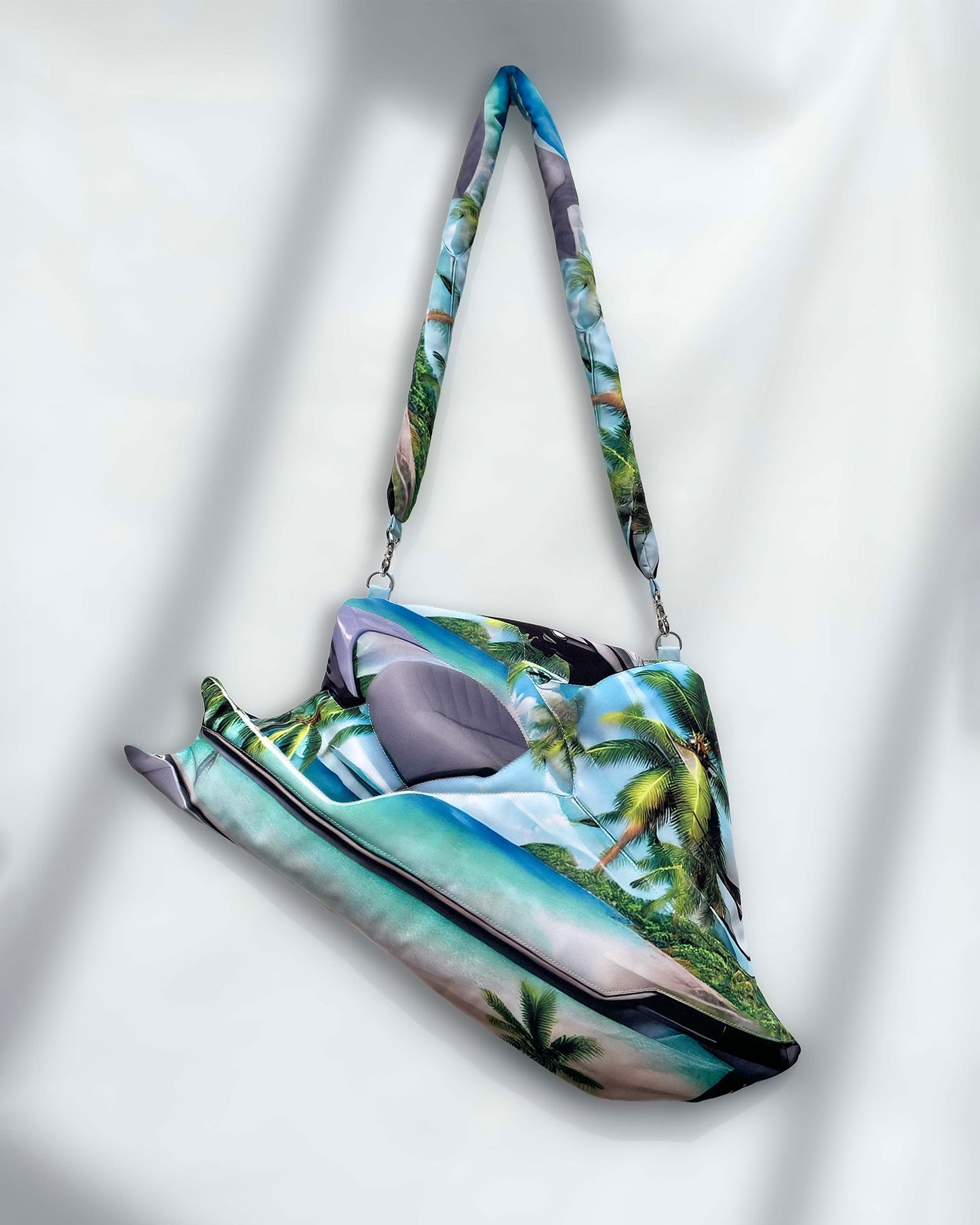 Tropical Jetski Bag laid flat, highlighting beachside jet ski silhouette and oceanic print with palm trees