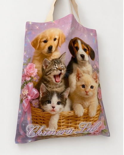 Other side of the Pet Calendar Tote Bag, showing two puppies and three kittens in a wicker basket, flowers and Chimera Lab lettering.