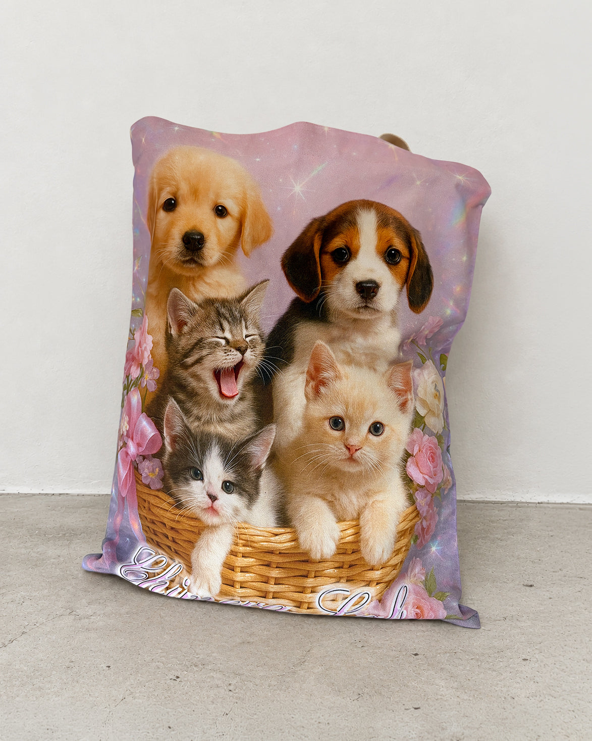 Pet Calendar Tote Bag standing upright, showing the kitten and puppy basket artwork with pastel flowers and sparkles.