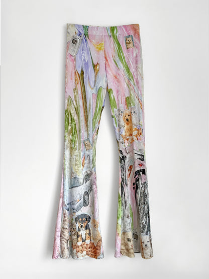 Colorful leggings with animal and car sticker prints on a white background.
