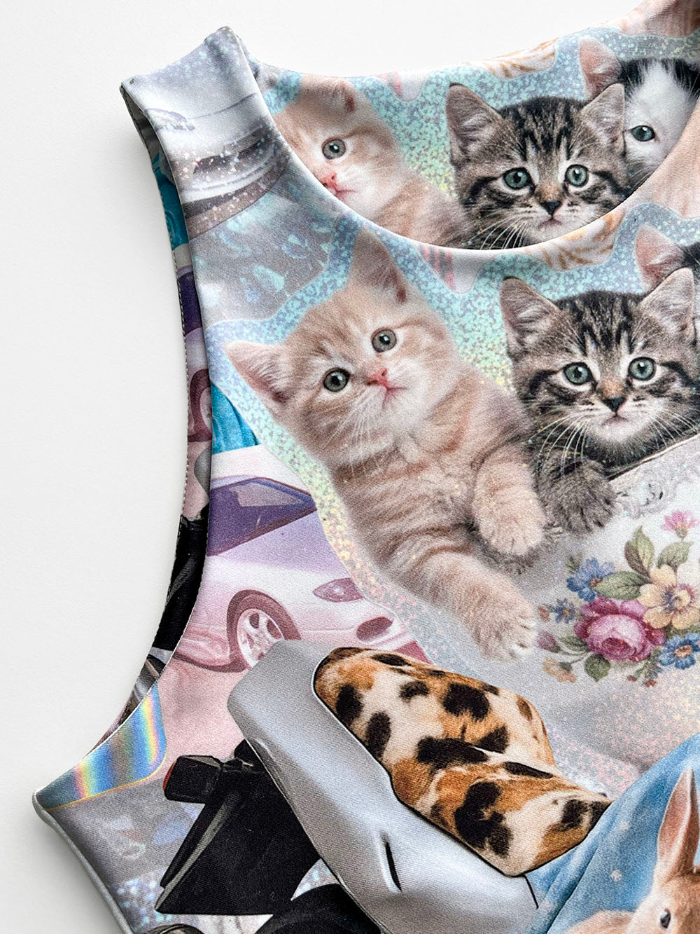 Tank top with nostalgic Y2K kitten print close-up.