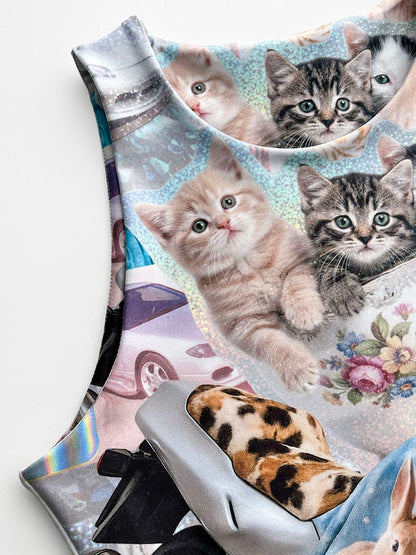 Tank top with nostalgic Y2K kitten print close-up.