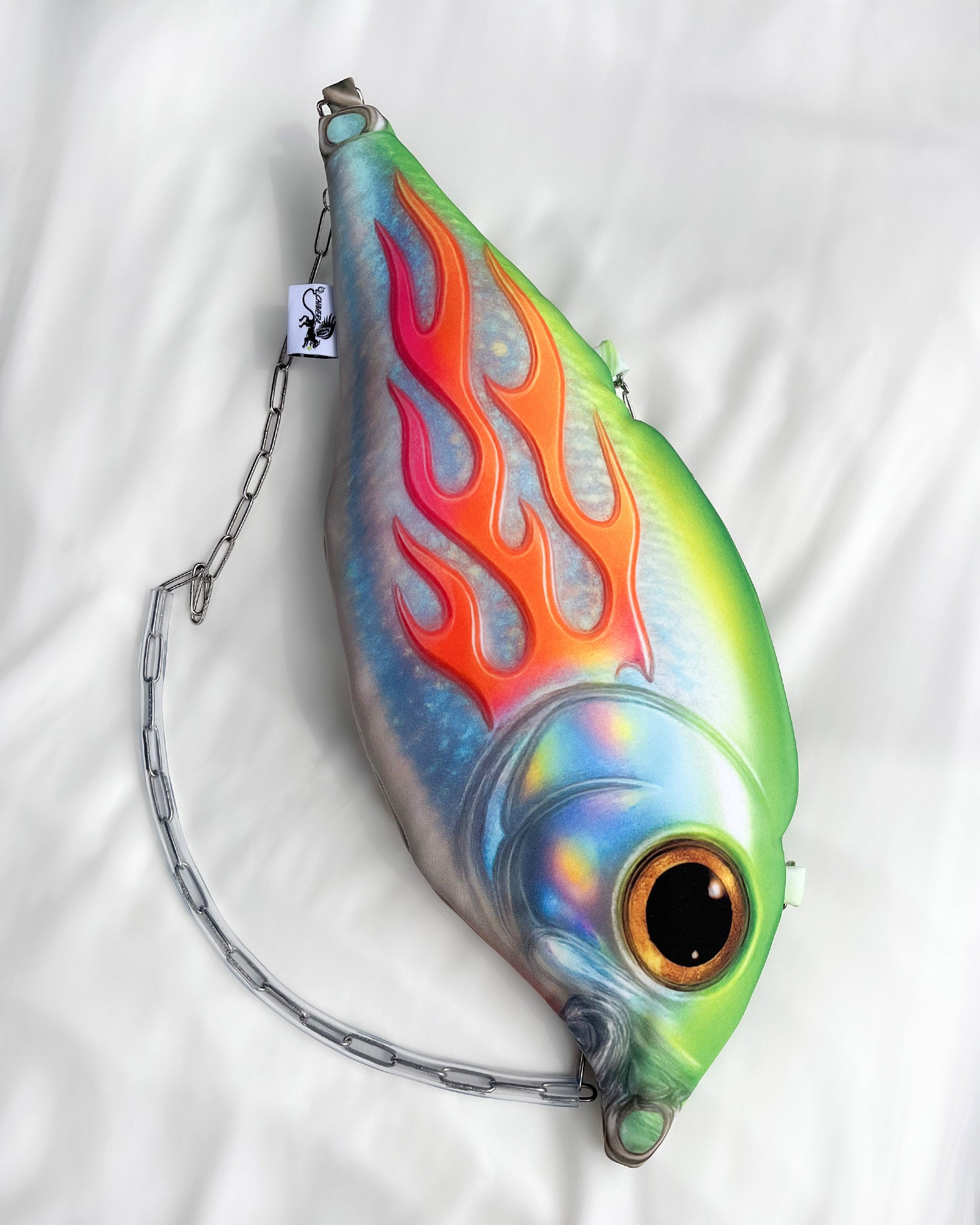 Flat lay of large Trophy Fish Bag with detachable chain strap on white background.