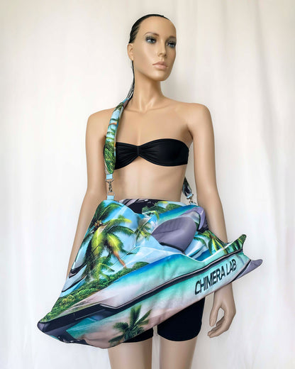 Mannequin wearing black bikini top and Tropical Jetski Bag with palm tree print, designed by Chimera Lab