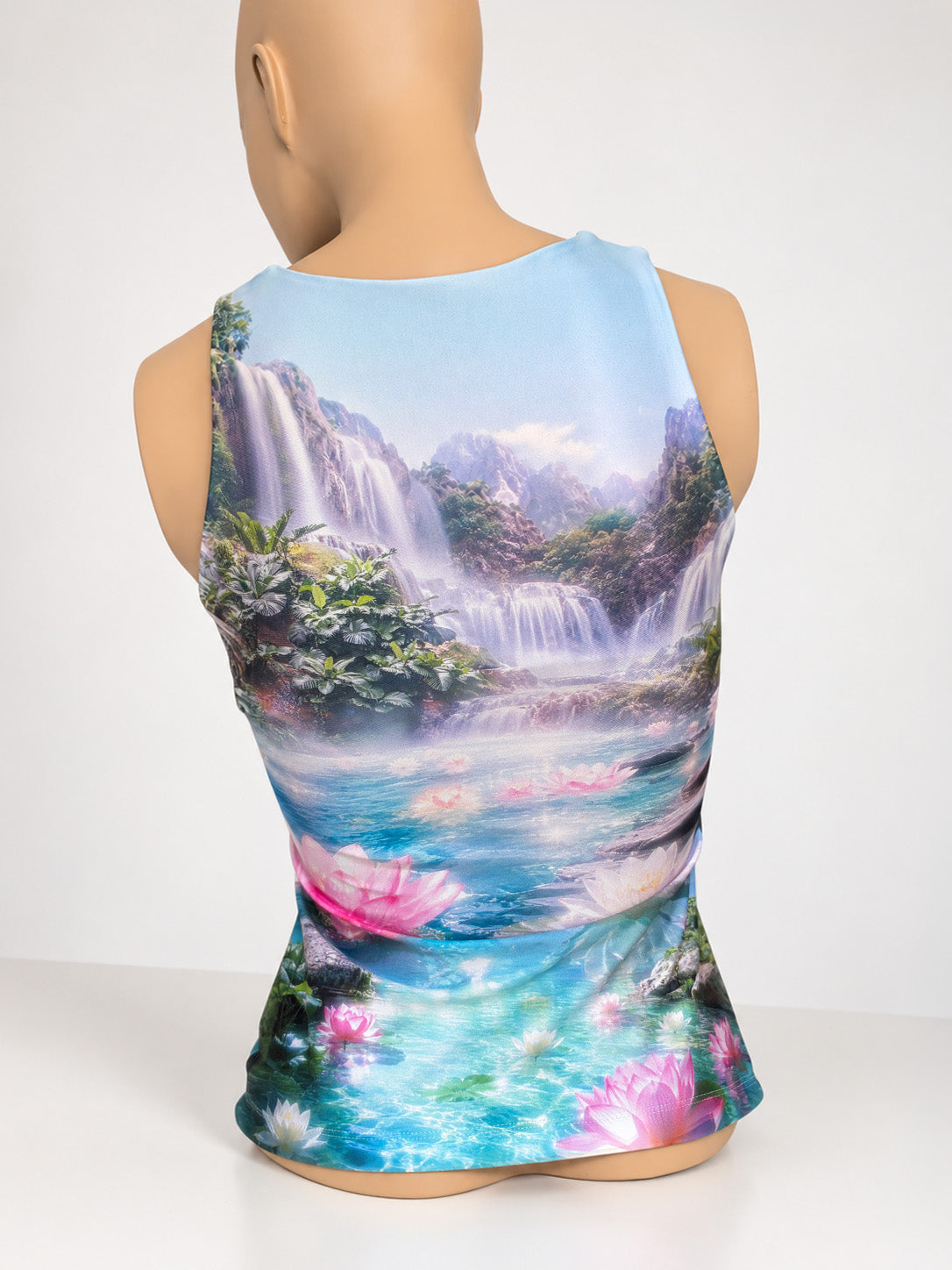 Back of the Lotus Flower Tank Top on a mannequin, showing the waterfall landscape print.